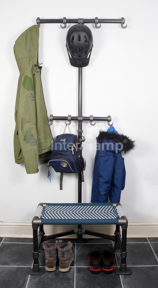 Interclamp key clamp fittings and tube used to create a versatile home coat stand that doubles as a seat, offering a functional and stylish storage solution.